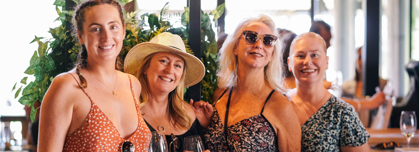 Women enjoying Swings & Roundabouts wines